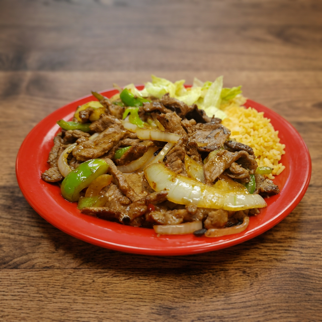 Fajitas de Res o Pollo.
